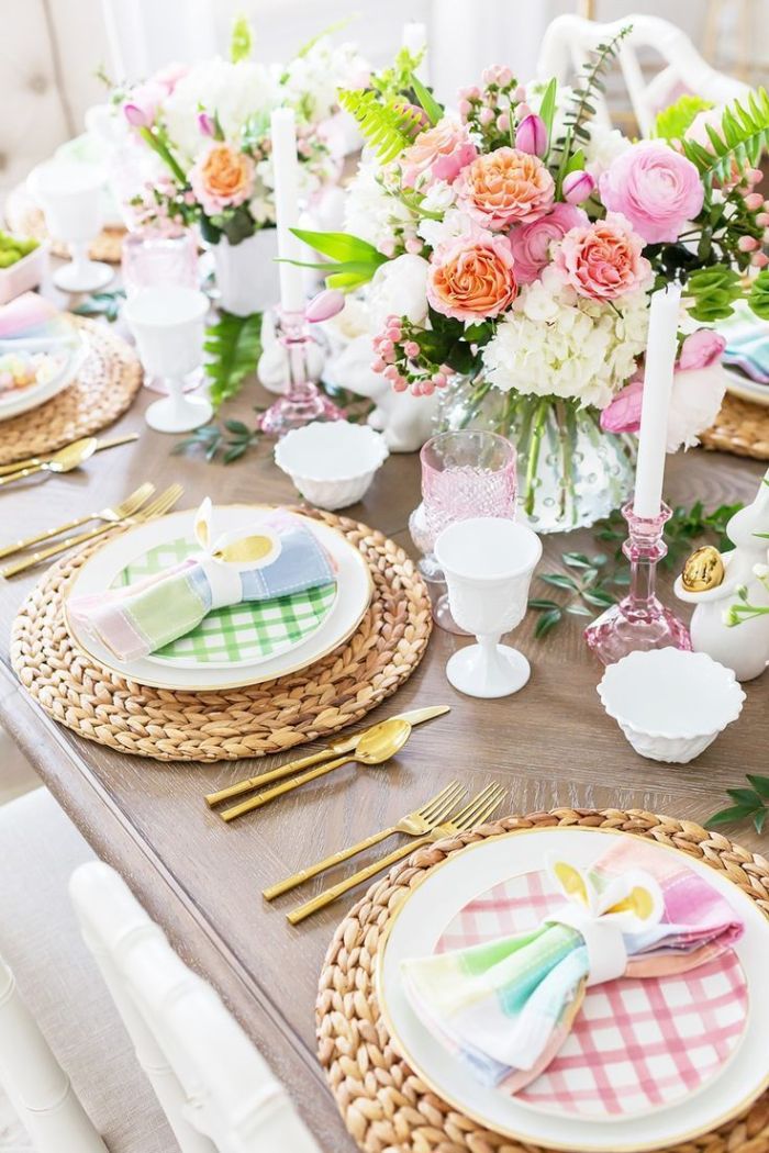 flowers in white ceramic vases in the middle of the table easter decoration ideas plate settings with colorful plates and napkins