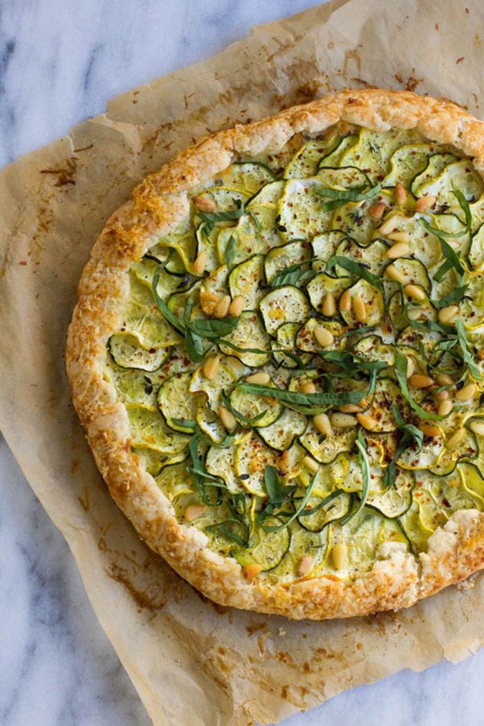 galette with summer squash and zucchini yellow squash recipes garnished with cedar nuts