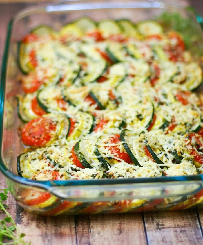 gratin with slices of squash zucchini and tomatoes how to cook squash garnished with shredded cheese