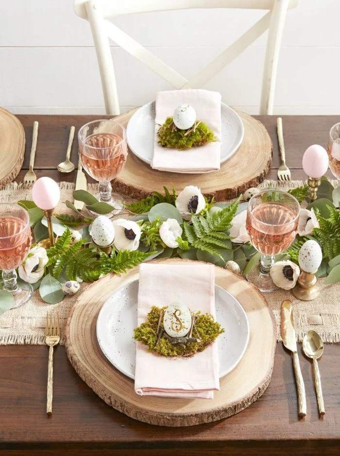 greenery table runner with eggs and flowers easter decoration ideas plate settings with wooden logs moss and eggs
