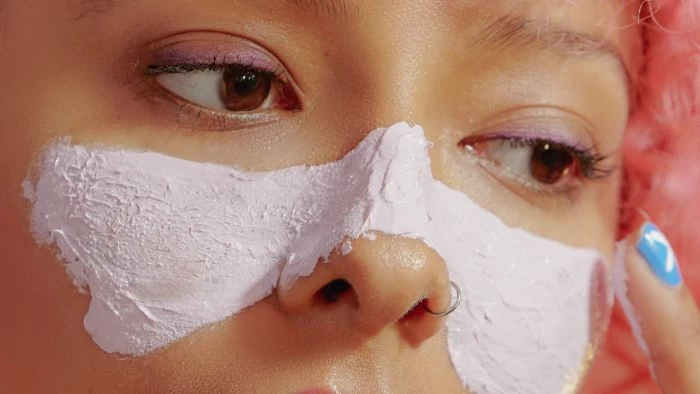 nose mask for blackheads how to make masks at home woman with pink hair wearing purple eyeliner