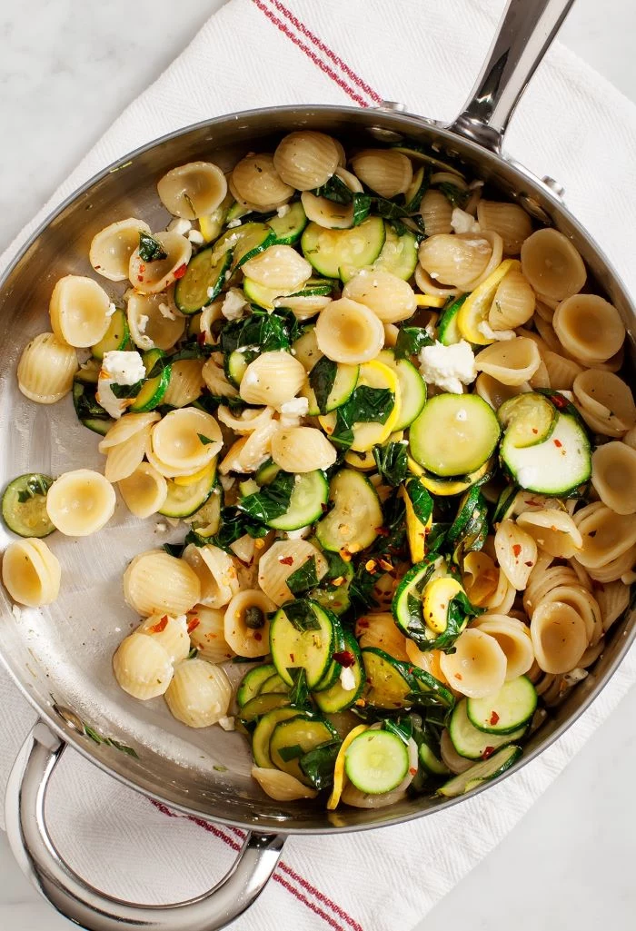 pasta cooked in sauce pan baked squash recipe with squash zucchini parsley red pepper powder