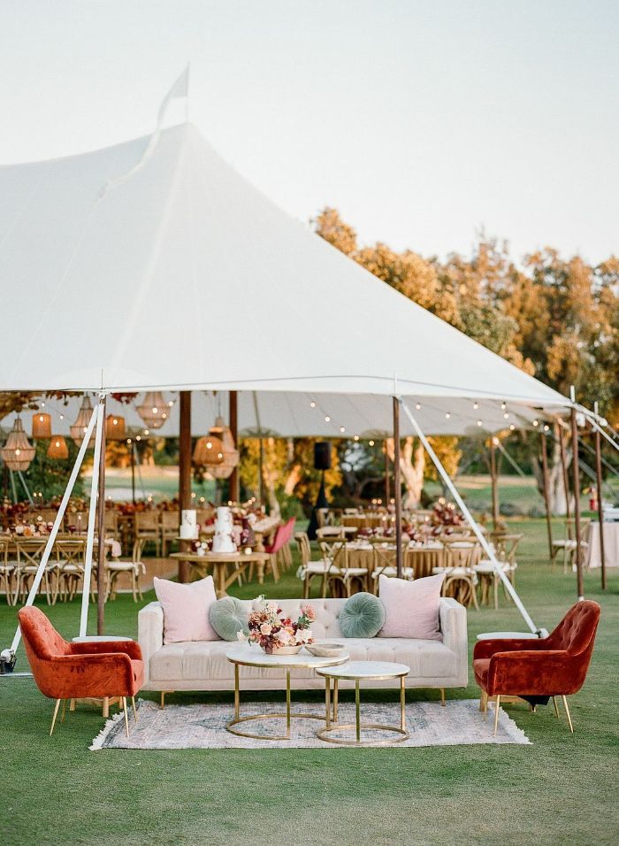 simple wedding decorations lounge area with large white sofa two brown velvet armchairs