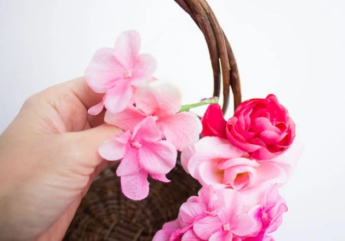 step by step diy tutorial diy easter basket how to decorate basket with faux flowers