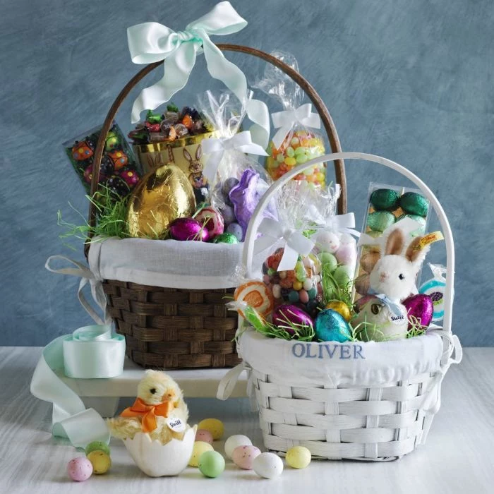 two baskets filled with all kinds of easter themed candy easter baskets for boys