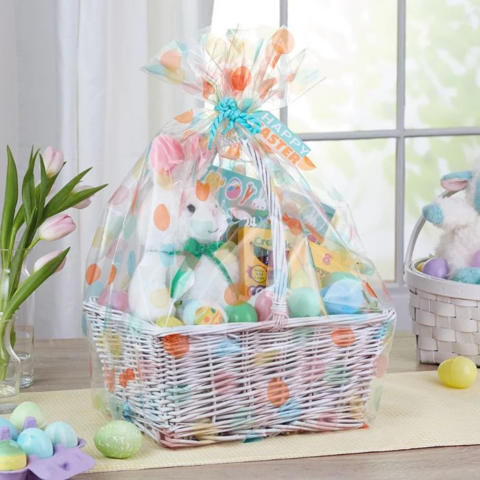 white basket wrapped in foil easter baskets for kids stuffed bunny coloring book crayons inside