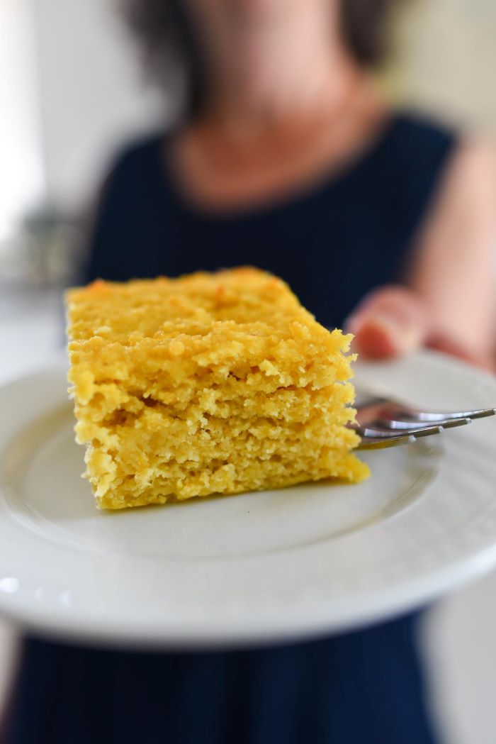 zucchini and squash recipes slice of cake made of squash placed on white plate
