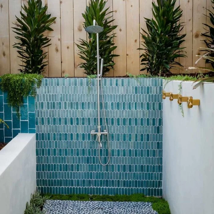 blue tiles on wall where shower head is mounted how to build an outdoor shower blue tiles on the floor