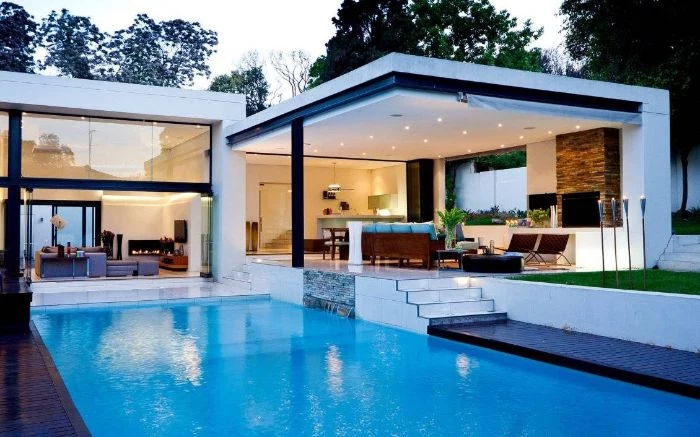 contemporary house with large pool modern pool designs large outside living room area