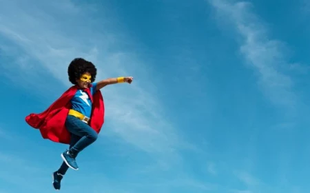 girl wearing a superhero cape fun things to do outside photographes as of shes flying