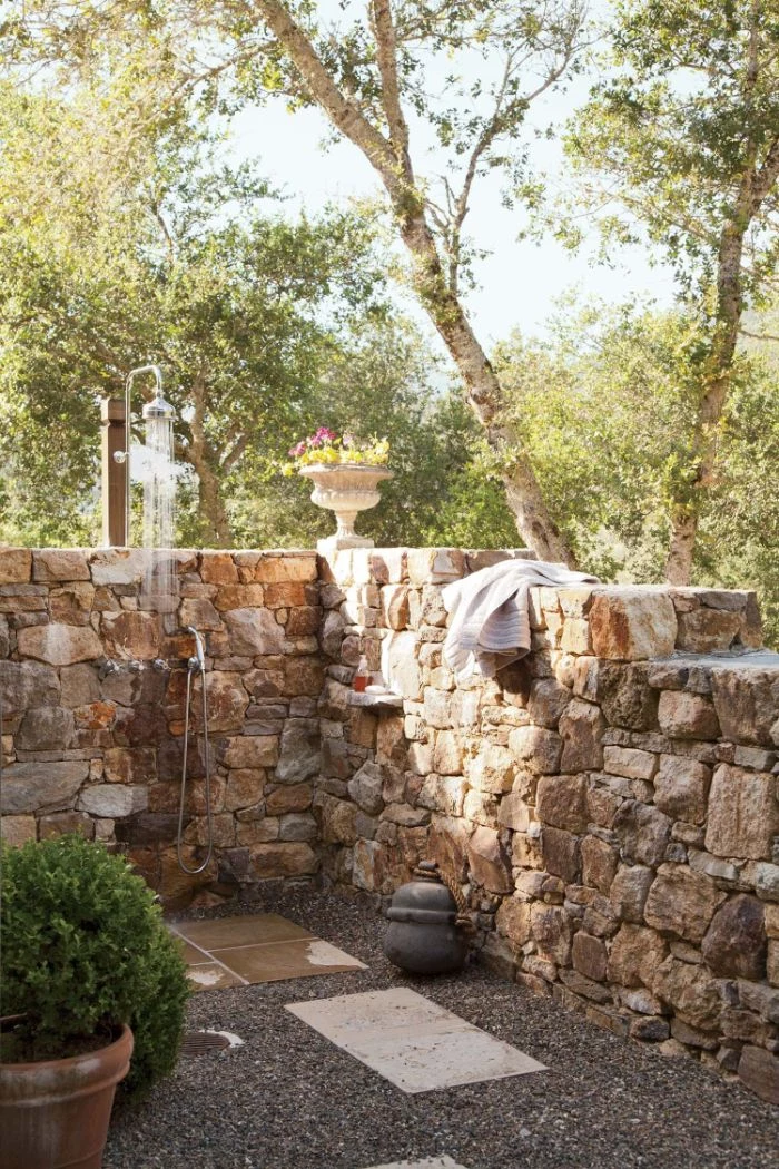 gravel and tiles on the floor diy outdoor shower enclosure stone wall with shower mounted on it
