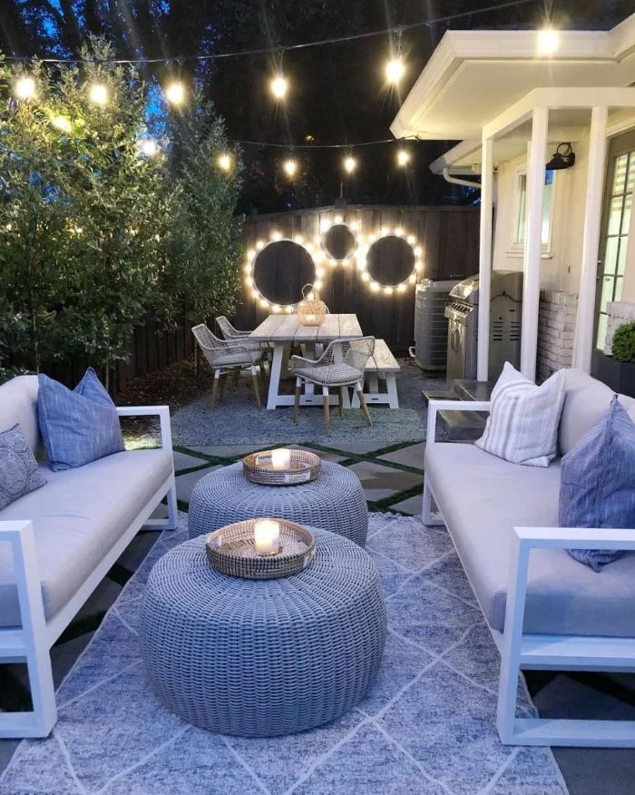 landscape lighting ideas strings of lights hanging above lounge area lamp wreaths hanging on the wall