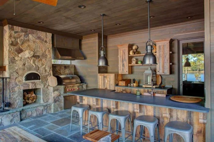 outdoor wooden bar enclosed outdoor kitchen with wooden kitchen island cabinets gray countertop gray bar stools