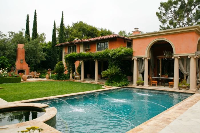 small inground pool cost spanish style home with pool with fountains ouside kitchen area
