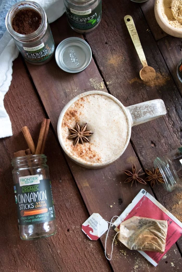star anise on top of coffee poured into ceramic mug how to make good coffee vegan chai latte recipe