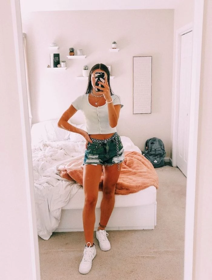 white crop top denim shorts white sneakers cute outfits for girls worn by girl with black hair