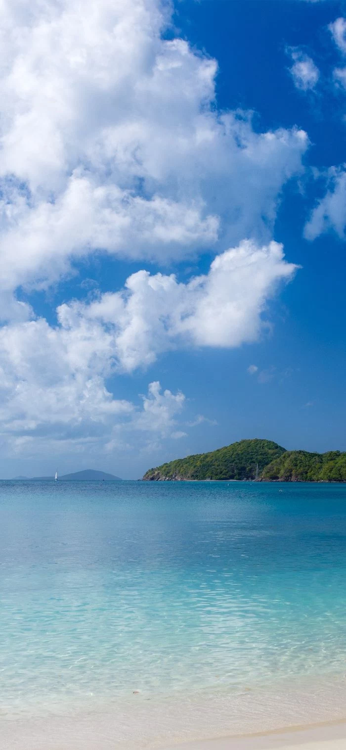 blue water and sky with clouds summer wallpaper hd island in the distance
