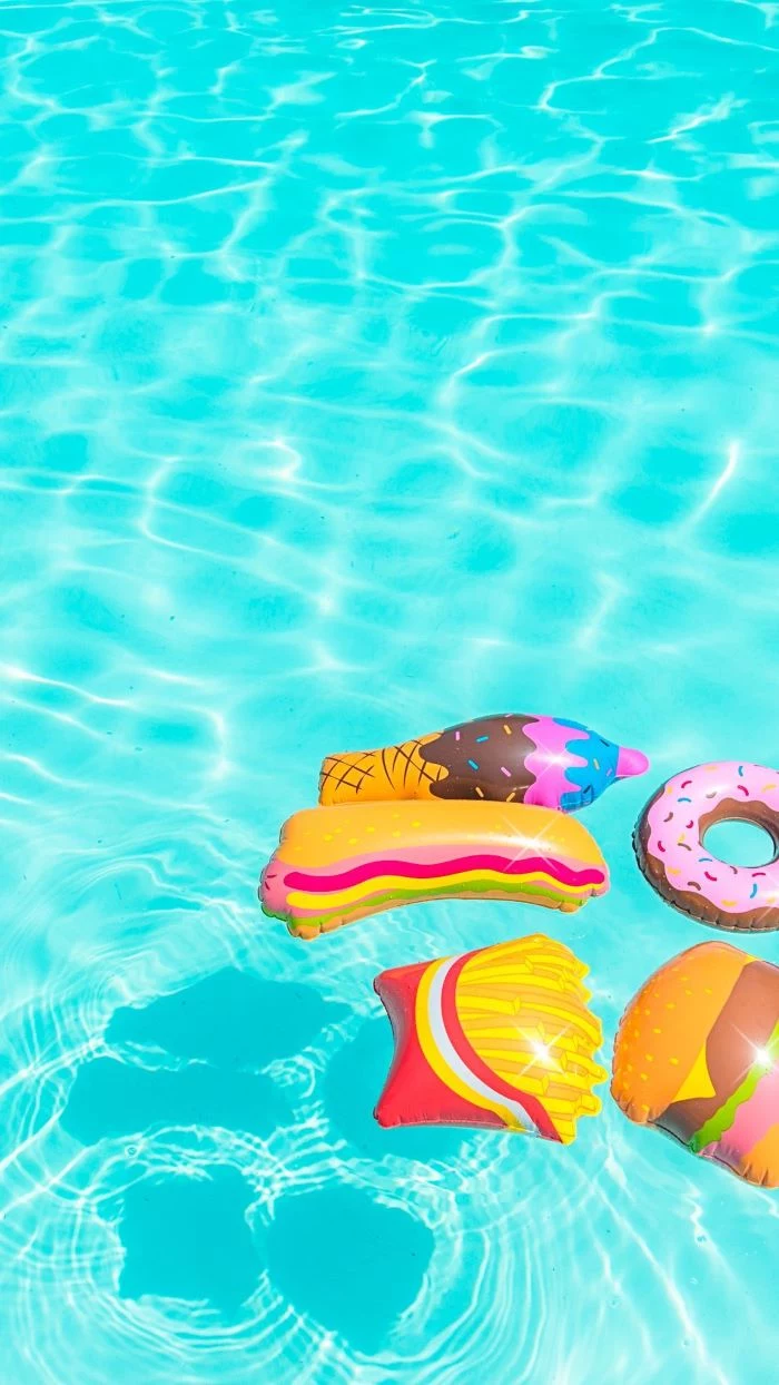 blue water in swimming pool summer cute backgrounds inflated pillows donut fries milkshake hot dog sandwich