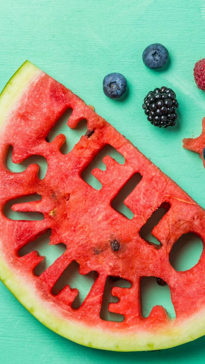 blueberries blackberries next to slice of watermelon beach aesthetic wallpaper hello summer carved on it
