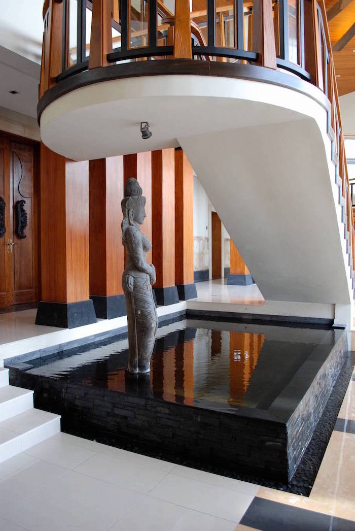 buddha water fountain statue inside pond under the stairs tabletop water fountain