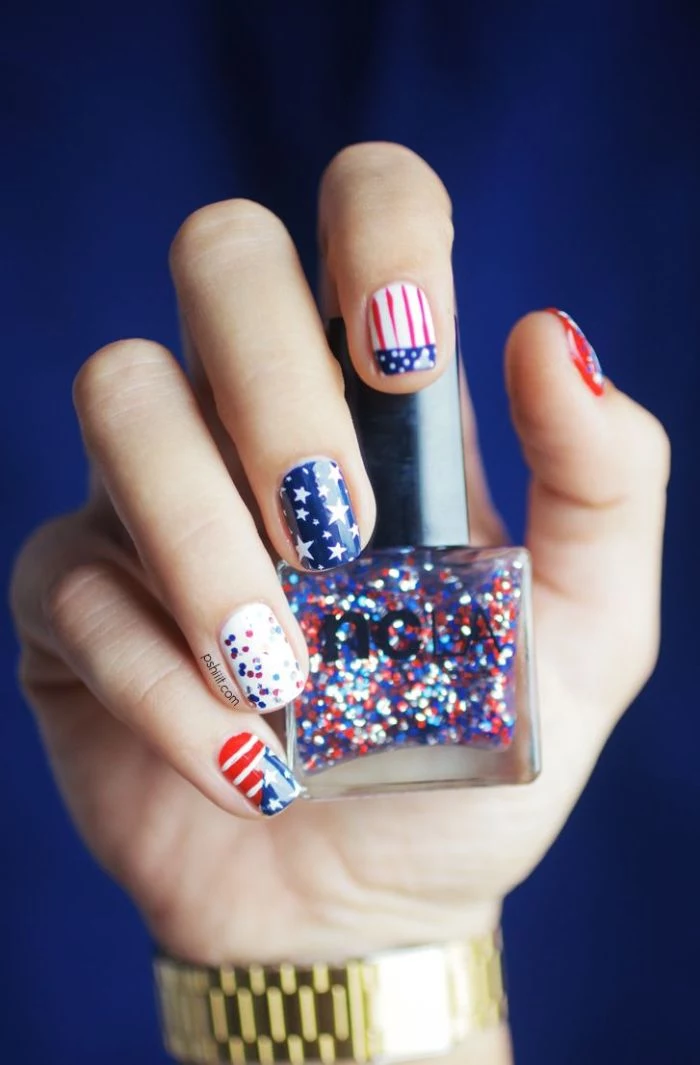 flag decorations stripes and stars on each nail 4th of july nails white blue red nail polish