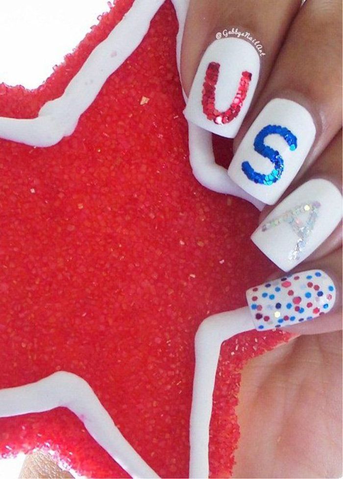 fourth of july nail designs usa spelled out with red white blue glitter on white nail polish