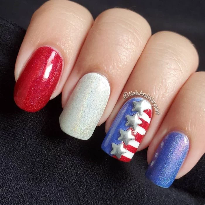 fourth of july nails red white blue glitter nail polish stars and stripes on the ring finger