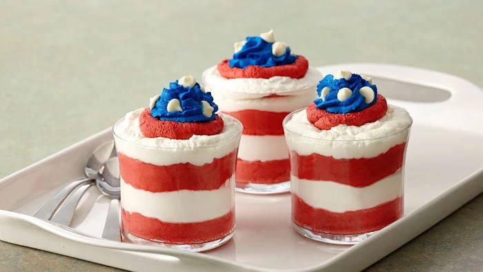 mini trifles with raspberry cream and cream cheese 4th of july food ideas decorated with blue cream on top