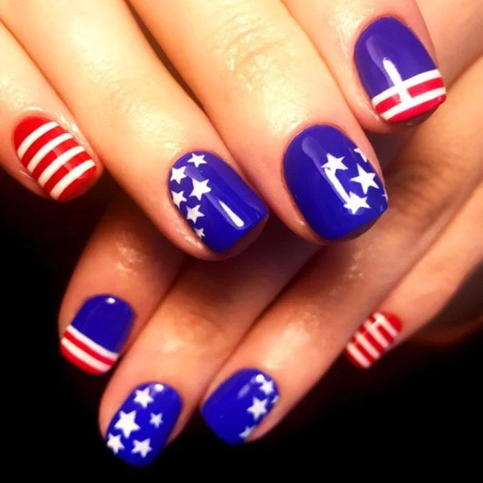 red and blue nail polish red white and blue nails stars and stripes decorations on each nail