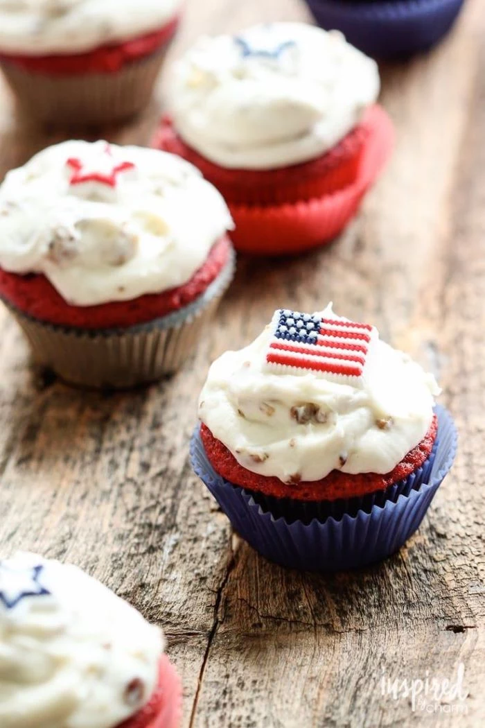 red velvet cupcakes decorated with white frosting easy 4th of july desserts american flag candy on top