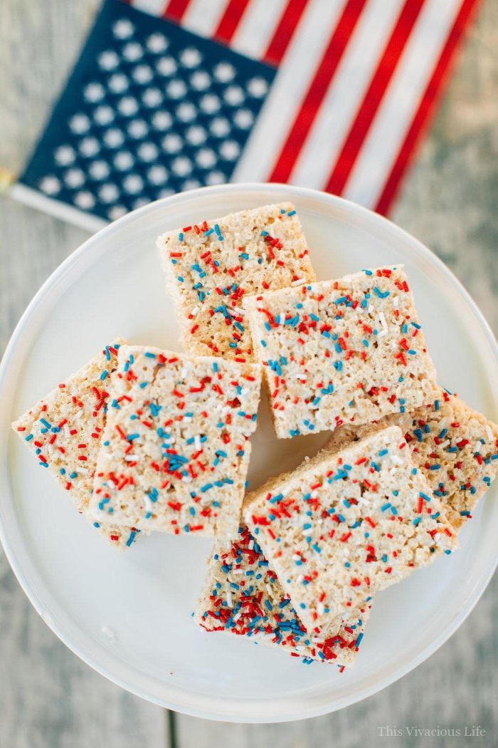 small bites of cake decorated with red white and blue sprinkles 4th of july desserts placed on white plate