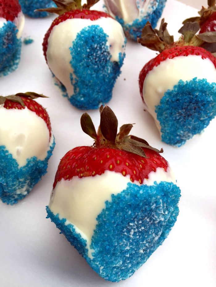 strawberries dipped in white chocolate 4th of july dessert recipes decorated with blue sugar