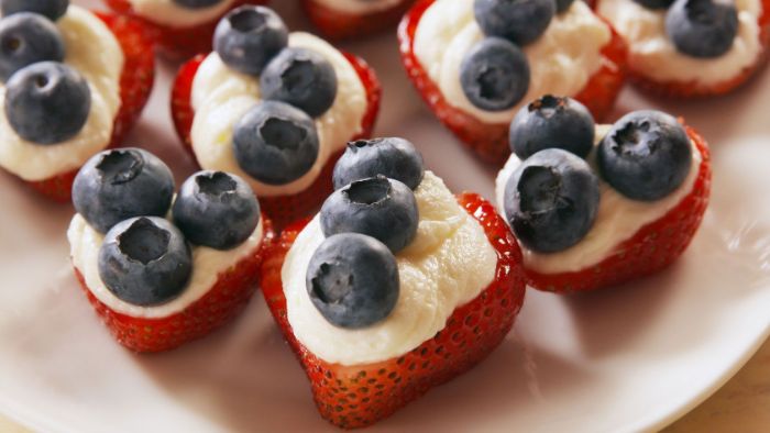 strawberries filled with cream cheese fourth of july desserts decorated with blueberries