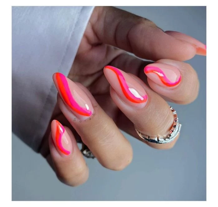 summer nail designs 2021 nude nail polish with pink and red lines on long stiletto nails