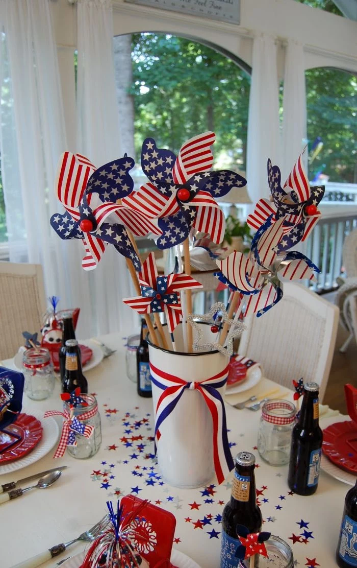 table centerpiece with red white blue ribbon 4th of july decorations red plates blue red stars