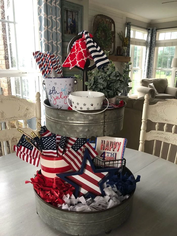 table decorations metal buckets filled with candy american flags 4th of july decorations red white and blue ribbons