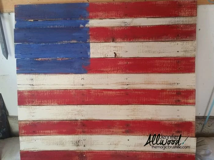 wooden pallet painted in red white and blue 4th of july outdoor decorations step by step diy tutorial