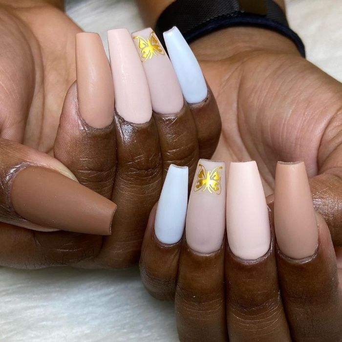 cute short acrylic nails long coffin nails in nude and white with matte finish gold butterfly decoration