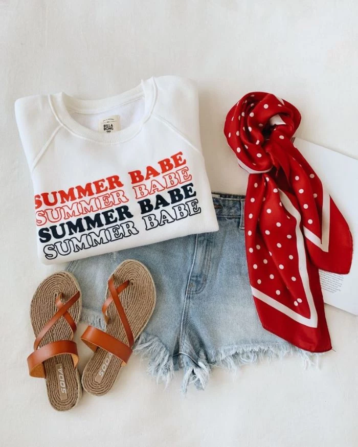 denim short white t shirt brown leather sandals red scarf 4th of july outfits for women laid out on white surface