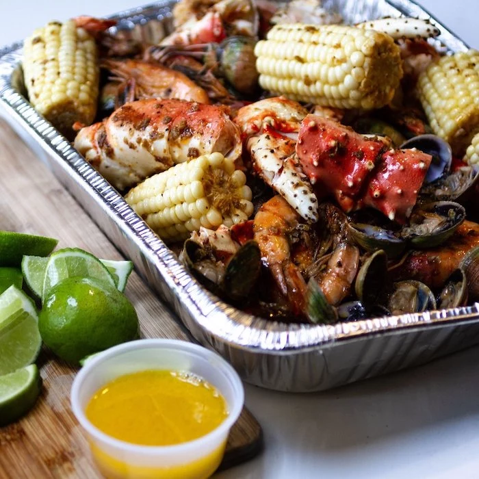 foil pan filled with corn on the cob how long to boil shrimp mussels lime wedges on the side