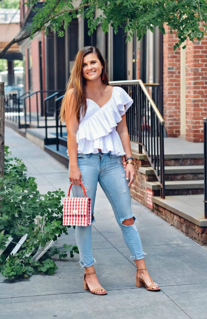 jeans white top nude sandals red and white striped bag 4th of july shirts for women worn by woman with long hair