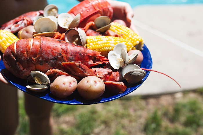 plate with lobster boil how to boil shrimp potatoes corn on the cob