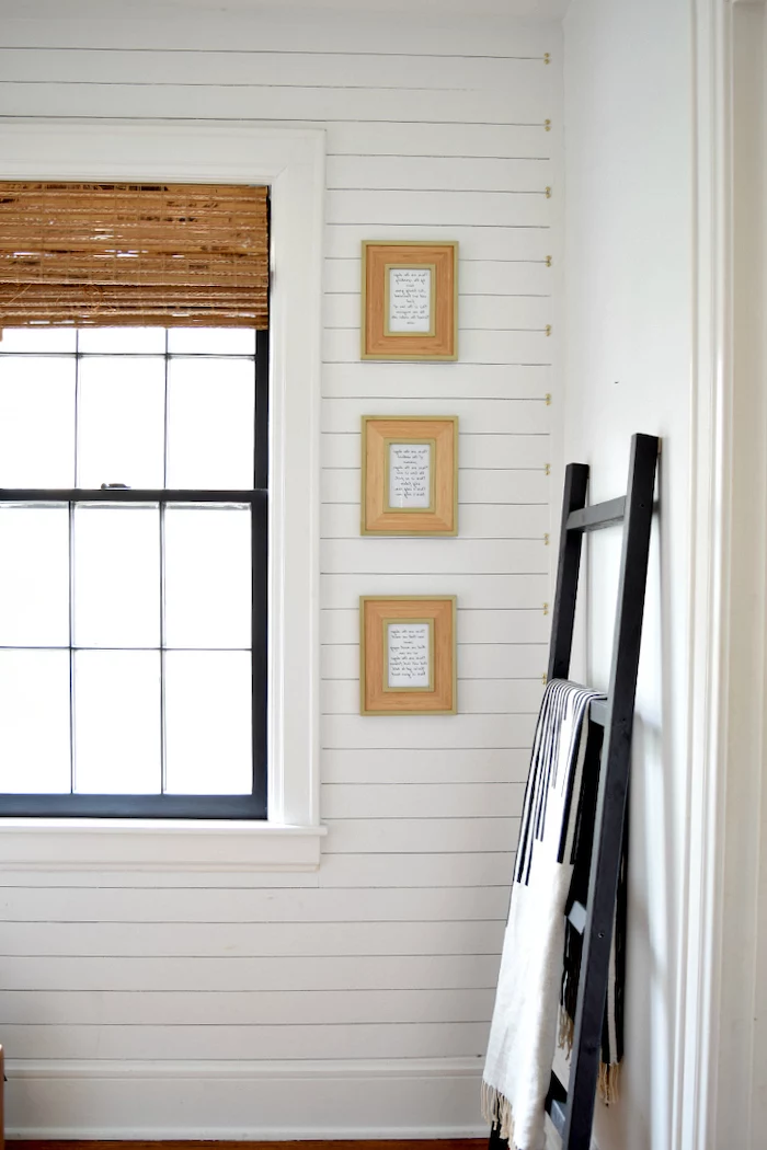 shiplap on the wall decorating ideas for entry hall three small framed quotes on the wall storage ladder