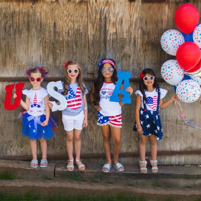 usa letters 4th of july outfits four kids holding them dressed in red white and blue patriotic outfits