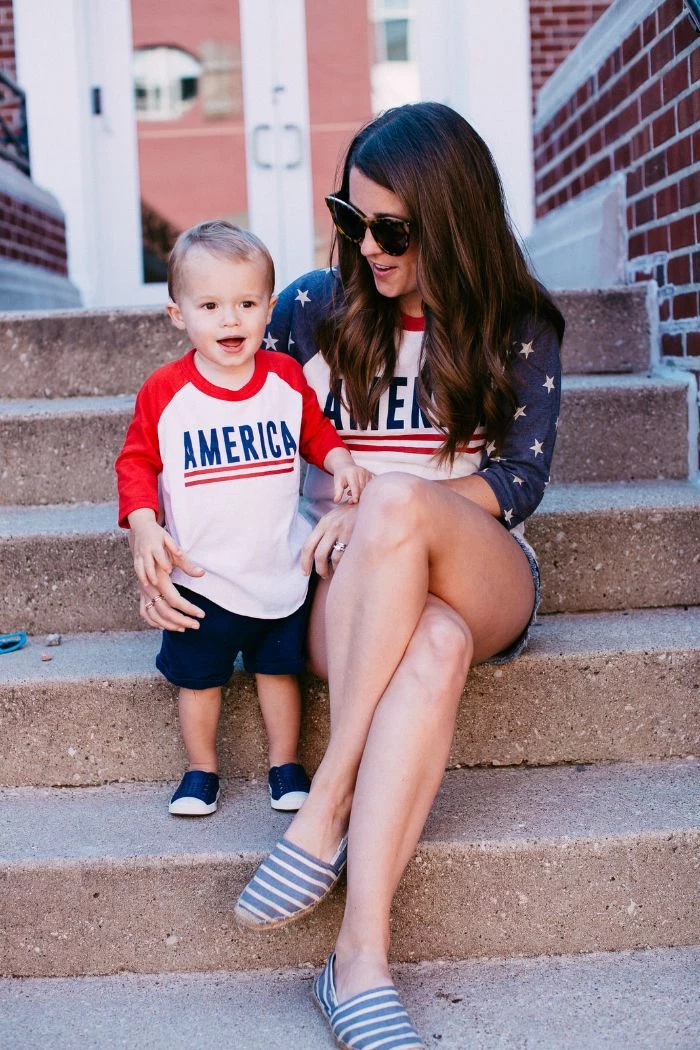 woman with toddler wearing america sweatshirts 4th of july outfits for women sitting on stairs