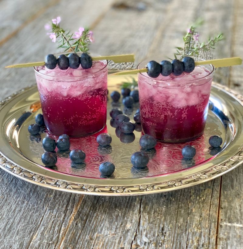 blue jellyfish vodka mixed drinks with blueberries