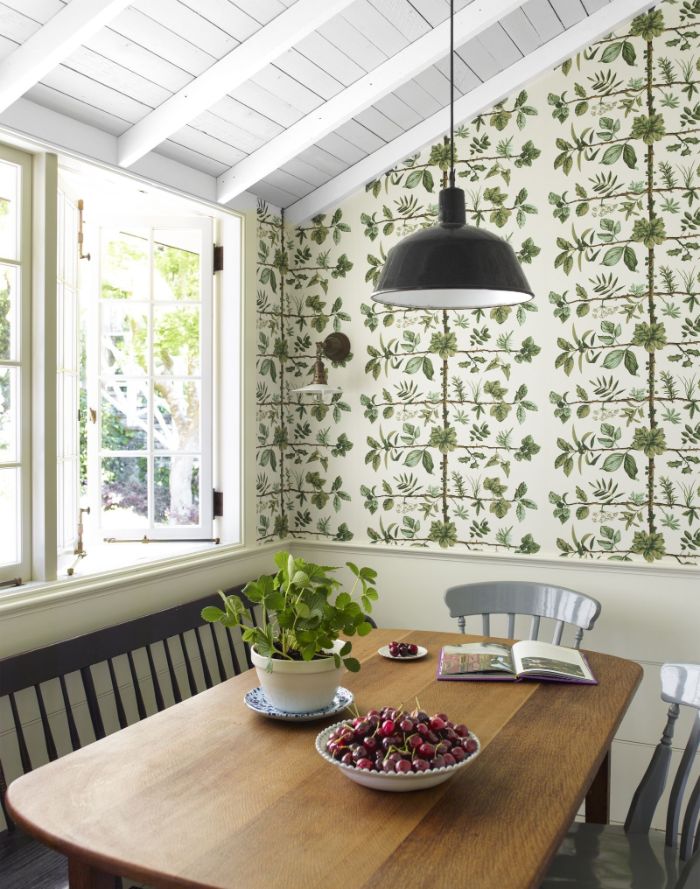 colorful wallpaper on the wall shiplap on the ceiling farmhouse kitchen table bench and chairs around table