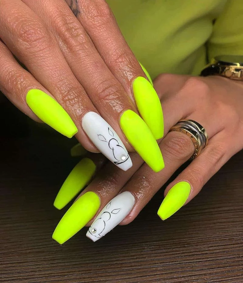 neon yellow nails white bunny decorations