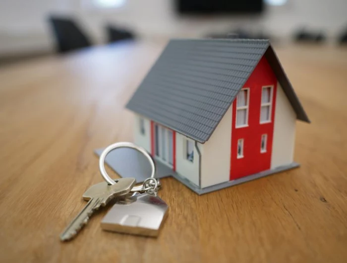 remodeling expenses small house keychain on table