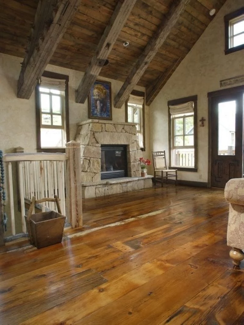 reclaimed wood in front of fireplace types of wood flooring